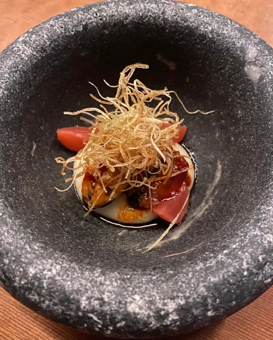 Chef Yoshi preparing a course